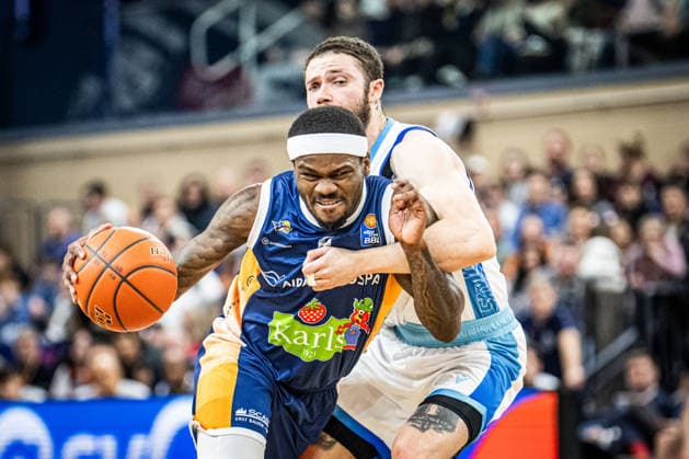 Rostock, Germany 03 January 2026 1 BBL 2025 2026 Rostock Seawolves vs Skyliners Frankfurt In the picture from left in the duel TJ Crockett Jr ROSTOCK SEAWOLVES and Logan Johnson Frankfurt Skyliners Copyright: xFotostandx xVoelkerx