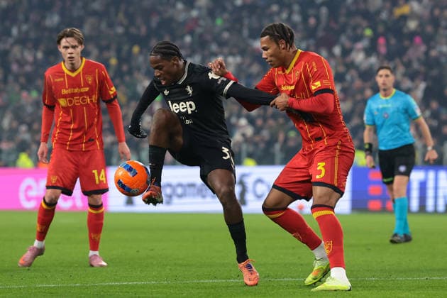 Turin, Italy, 3rd January 2026. Thorir Johann Helgason of US Lecce looks on as Jonathan David of Juventus shields the ball from Corrie Ndaba of US Lecce during the Juventus vs Lecce Serie A match at Allianz Stadium, Turin. Picture credit should read: Jonathan Moscrop Sportimage EDITORIAL USE ONLY. No use with unauthorised audio, video, data, fixture lists, club league logos or live services. Online in-match use limited to 120 images, no video emulation. No use in betting, games or single club league player publications. SPI_049_JM_JUVE_LECCE SPI-4406-0049