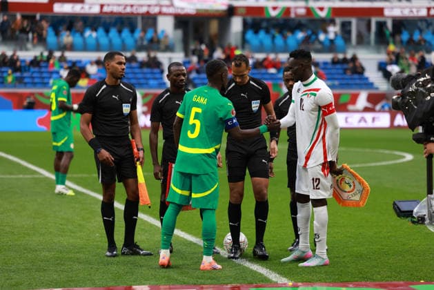 Tangier, Morocco - January 3: Referee: Dahane Beida (Mauritania)Assistant Referee : Jerson Dos Santos (Angola), Ivanildo Lo (Angola), Fourth Official: Bouchra Karboubi (Morocco) and Idrissa Gueye of Senegal national team, Nationalteam and Bakhit Khamis of Sudan national team during the Africa Cup of Nations Round of 16 match between Senegal National team and Sudan at Ibn Batouta Stadium on January 3, 2026 in Tangier, Morocco. Senegal v Sudan - Round Of 16 - Africa Cup of Nations 2025 Copyright: xSFSIx