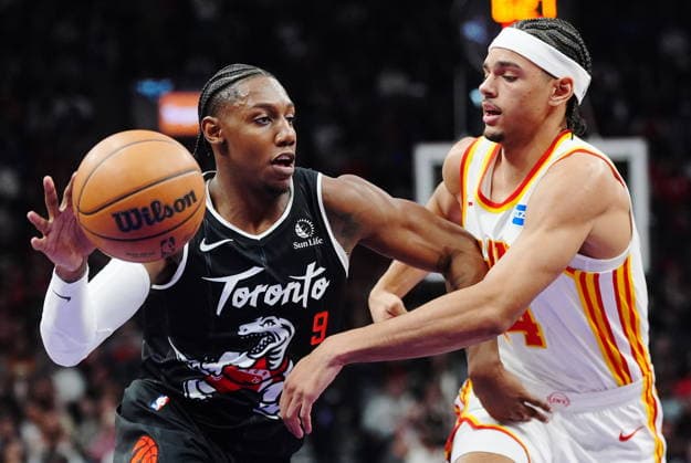 January 3, 2026, Toronto, On, Canada: Toronto Raptors RJ Barrett (9) drives past Atlanta Hawks Asa Newell (14) during first half NBA, Basketball Herren, USA basketball action in Toronto on Saturday, Jan. 3, 2026. Canada News - January 3, 2026  - ZUMAc35_ 20260103_zaf_c35_076 Copyright: xFrankxGunnx