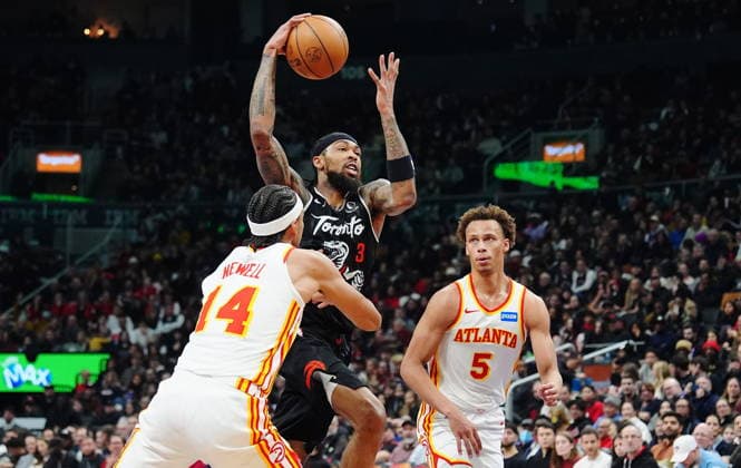 January 3, 2026, Toronto, On, Canada: Toronto Raptors Brandon Ingram (3) drives between Atlanta Hawks Asa Newell (14) and Dyson Daniels (5) during first half NBA, Basketball Herren, USA basketball action in Toronto on Saturday, Jan. 3, 2026. Canada News - January 3, 2026  - ZUMAc35_ 20260103_zaf_c35_078 Copyright: xFrankxGunnx