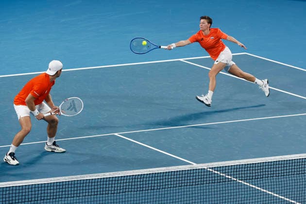 TENNIS UNITED CUP SYDNEY, Demi Schuurs of Team Netherlands playing with Tallon Griekspoor of Team Netherlands plays a forehand in their Group F doubles match against Laura Siegemund of team Gemany and Alexander Zverev of team Germany during day three of the 2026 United Cup at Ken Rosewall Arena in Sydney, Sunday, January 4, 2026. ( NO ARCHIVING, EDITORIAL USE ONLY SYDNEY NEW SOUTH WALES AUSTRALIA  Copyright: xMARKxEVANSx 20260104147497098422