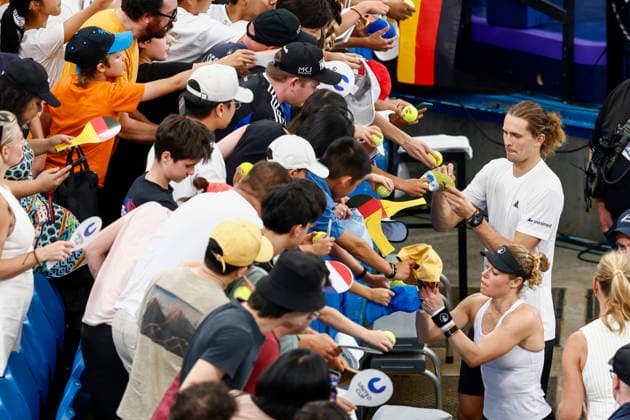 TENNIS UNITED CUP SYDNEY, Laura Siegemund of team Gemany and Alexander Zverev of team Germany sign autographs after winning their Group F doubles match against Demi Schuurs of Team Netherlands and Tallon Griekspoor of Team Netherlands during day three of the 2026 United Cup at Ken Rosewall Arena in Sydney, Sunday, January 4, 2026. ( NO ARCHIVING, EDITORIAL USE ONLY SYDNEY NEW SOUTH WALES AUSTRALIA  Copyright: xMARKxEVANSx 20260104136828688867