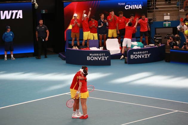 SYDNEY, AUSTRALIA - JANUARY 03: Zhang Zhizhen hugs Zhu Lin of Team China after winning the Group B Mixed Doubles match against Elise Mertens and Zizou Bergs of Team Belgium on day 2 of the 2026 United Cup at Ken Rosewall Arena on January 3, 2026 in Sydney, Australia.  Copyright: xChinaxNewsxServicex 111613099233