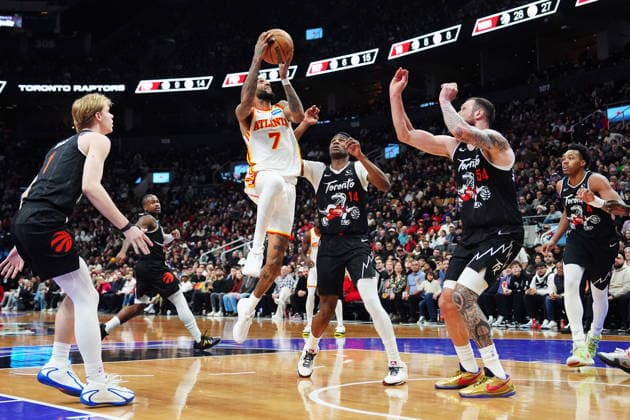 January 3, 2026, Toronto, On, Canada: Atlanta Hawks Nickeil Alexander-Walker (7) shoots as Toronto Raptors Gradey Dick (left), Ja Kobe Walter (14) and Sandro Mamukelashvili (54) defend during second half NBA, Basketball Herren, USA basketball action in Toronto on Saturday, Jan. 3, 2026. Canada News - January 3, 2026 - ZUMAc35_ 20260103_zaf_c35_121 Copyright: xFrankxGunnx