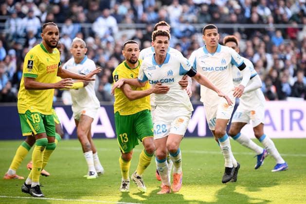 Olympique de Marseille v FC Nantes - Ligue 1 McDonald s 2025 2026 19 Youssef EL ARABI (fcn) - 13 Francis COQUELIN (fcn) - 28 Benjamin PAVARD (om) during the Ligue 1 McDonald s match between Marseille and Nantes at Stade Velodrome on January 4, 2026 in Marseille, France. Marseille France  Copyright: xFEPx 776348243