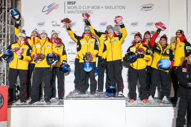 WINTERBERG, GERMANY - JANUARY 04: A triple german podest with gold medalists Francesco Friedrich, Matthias Sommer, Alexander Schüller and Costa Laurenz of Germany, silver medalists Johannes Lochner, Oliver Peschk, Jörn Wenzel and Georg Fleischhauer of Germany and bronze medalists Adam Ammour, Issam Ammour, Joshua Tasche and Alexander Schaller of Germany celebrating their medals on day 3 of the IBSF World Cup 2025 2026 at Veltins Ice Arena of Winterberg after heat 2 of the 4-man bobsleigh competition on 04.1.2026 in Northrhine-Westphalia Germany. Photo Oliver Kremer Beautiful Sports. Northrhine-Westphalia Germany Copyright: xBEAUTIFULxSPORTS OliverxKremerx
