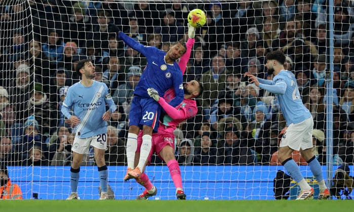 Manchester City v Chelsea - Premier League Joao Pedro of Chelsea and Gianluigi Donnarumma, goalkeeper of Manchester City challenge during the Premier League match between Manchester City and Chelsea at Etihad Stadium on January 4, 2026 in Manchester, England. WARNING! This Photograph May Only Be Used For Newspaper And Or Magazine Editorial Purposes. May Not Be Used For Publications Involving 1 player, 1 Club Or 1 Competition Without Written Authorisation From Football DataCo Ltd. For Any Queries, Please Contact Football DataCo Ltd on +44 (0) 207 864 9121 Manchester Etihad Stadium England United Kingdom Copyright: xAllstarxPicturexLibraryxLtdx