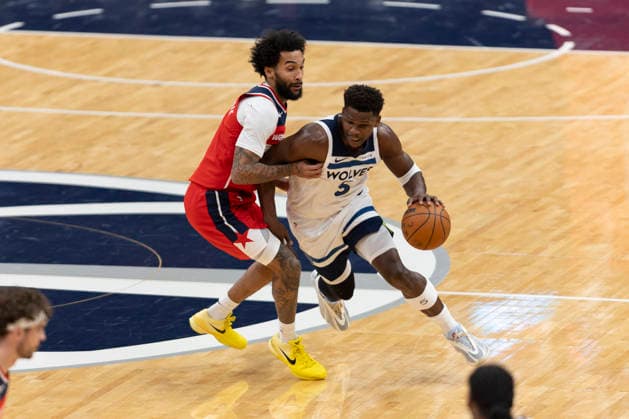 WASHINGTON, DC - JANUARY 04: Minnesota Timberwolves guard Anthony Edwards (5) drives past Washington Wizards forward Justin Champagnie (9) during a game between Minnesota Timberwolves and Washington Wizards on January 4, 2026 at the Capital One Arena in Washington, DC. (Photo by Charles Brock Icon Sportswire) NBA, Basketball Herren, USA JAN 04 Minnesota Timberwolves at Washington Wizards EDITORIAL USE ONLY Icon260104010