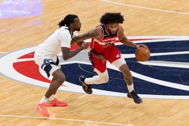 WASHINGTON, DC - JANUARY 04: Washington Wizards forward Marvin Bagley III (35) dribbles past Minnesota Timberwolves center Naz Reid (11) during a game between Minnesota Timberwolves and Washington Wizards on January 4, 2026 at the Capital One Arena in Washington, DC. (Photo by Charles Brock Icon Sportswire) NBA, Basketball Herren, USA JAN 04 Minnesota Timberwolves at Washington Wizards EDITORIAL USE ONLY Icon260104028