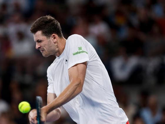 (260105) -- SYDNEY, Jan. 5, 2026 -- Hubert Hurkacz of Poland hits a return during the men s singles match against Alexander Zverev of Germany in the Group F round robin match between Poland and Germany at the 2026 United Cup tennis tournament in Sydney, Australia, Jan. 5, 2026. ) (SP)AUSTRALIA-SYDNEY-TENNIS-UNITED CUP-GER VS POL MaxPing 