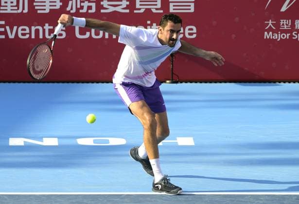 (260105) -- HONG KONG, Jan. 5, 2026 -- Marin Cilic hits a return during the men s singles round of 32 match between Marin Cilic of Croatia and Adrian Mannarino of France at the ATP, Tennis Herren Hong Kong Open tennis tournament in Hong Kong, China, Jan. 5, 2026. ) (SP)CHINA-HONG KONG-TENNIS-ATP HONG KONG OPEN (CN) LoxPingxFai 