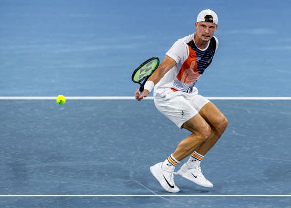 January 5, 2026, Brisbane, Qld, Australia: MARTON FUCSOVICS of Hungary plays a backhand during his MenÃ¢â‚¬â ¢s Singles round one match against DANIIL MEDVEDEV of Russia at the Brisbane International. Brisbane Australia - ZUMAt173 20260105_zsp_t173_048 Copyright: xStephanexThomasx