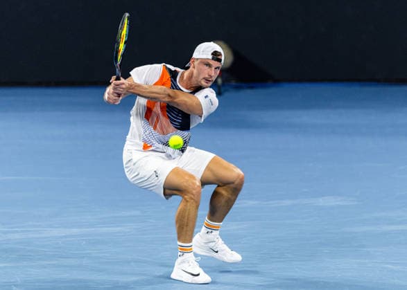 January 5, 2026, Brisbane, Qld, Australia: MARTON FUCSOVICS of Hungary plays a backhand during his MenÃ¢â‚¬â ¢s Singles round one match against DANIIL MEDVEDEV of Russia at the Brisbane International. Brisbane Australia - ZUMAt173 20260105_zsp_t173_044 Copyright: xStephanexThomasx