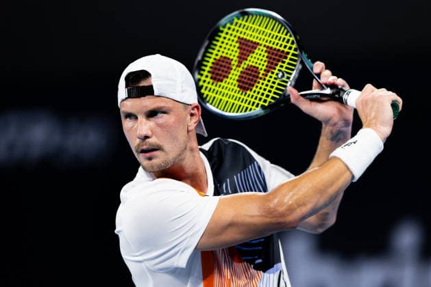 January 5, 2026, Brisbane, Qld, Australia: MARTON FUCSOVICS of Hungary plays a backhand during his MenÃ¢â‚¬â ¢s Singles round one match against DANIIL MEDVEDEV of Russia at the Brisbane International. Brisbane Australia - ZUMAt173 20260105_zsp_t173_055 Copyright: xStephanexThomasx