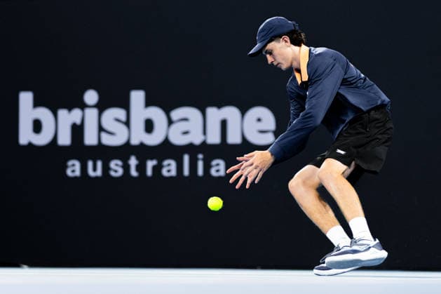 January 5, 2026, Brisbane, Qld, Australia: A ballkid catches a ball during the MenÃ¢â‚¬â ¢s Singles round one match between TOMAS MACHAC of Czechia and JIRI LEHECKA of Czechia at the Brisbane International. Brisbane Australia - ZUMAt173 20260105_zsp_t173_068 Copyright: xStephanexThomasx