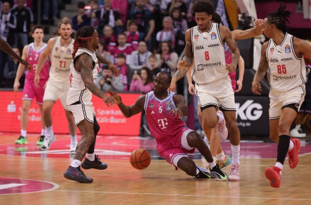 Tylan Birts Bonn fouled on the floor by Cobe Williams Bamberg, L , Telekom Baskets Bonn vs Bamberg Baskets, easyCredit BBL, Matchday 14, Bonn, 05 01 2026