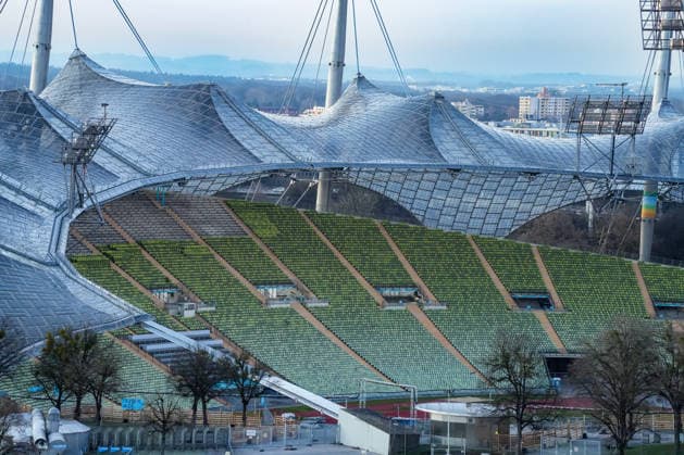 Das Olympiastadion in München The stadium was built for the 1972 Summer Olympics. Its unique, transparent tent roof construction is considered an architectural highlight worldwide. (License=RM) 24416766 Copyright: xZoonar.com SandraAlkadox 24416766