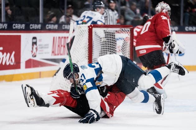 260105 Matias Vanhanen of Finland and Cameron Reid of Canada during the 2026 IIHF World Junior Championship bronze medal game between Canada and Finland on January 5, 2026 in Saint Paul Photo Joel Marklund BILDBYRAN kod JM JM0773 bbeng ishockey ice hockey jvm junior vm u20 2026 iihf world junior championship world juniors bronsmatch bronze medal game canada kanada finlandfinland  Copyright: JOELxMARKLUND BB260105JM026