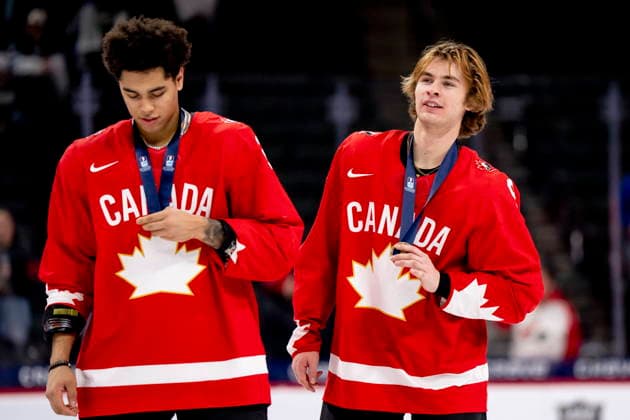 January 5, 2026, St. Paul, Mn, USA: Canada s Kashawn Aitcheson (2), left, and Gavin McKenna (9) celebrate after defeating Finland for the bronze medal in the 2026 IIHF World Junior Hockey Championship, in St. Paul on Monday, Jan. 5, 2026. Canada News - January 5, 2026 - ZUMAc35_ 20260105_zaf_c35_064 Copyright: xChristopherxKatsarovx