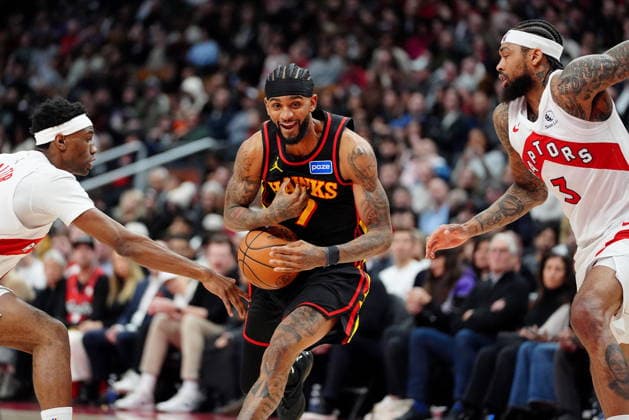 January 5, 2026, Toronto, On, CANADA: Atlanta Hawks guard Nickeil Alexander-Walker (7) gets the ball stripped by Toronto Raptors guard Ja kobe Walter (14) as teammate Brandon Ingram (3) looks on during second half NBA, Basketball Herren, USA basketball action in Toronto, Monday, Jan. 5, 2026. Canada News - January 5, 2026 - ZUMAc35_ 20260105_zaf_c35_082 Copyright: xFrankxGunnx