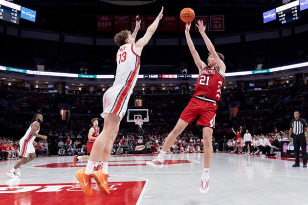 January 5, 2026, Columbus, Ohio, U.S: Nebraska Cornhuskers forward Pryce Sandfort (21) shoots a fall away jump shot over Ohio State Buckeyes center Christoph Tilly (13) during the game between the Nebraska Cornhuskers and the Ohio State Buckeyes at Value City Arena, Columbus, Ohio. Columbus U.S - ZUMAs304 20260105_zaf_s304_017 Copyright: xScottxStuartx