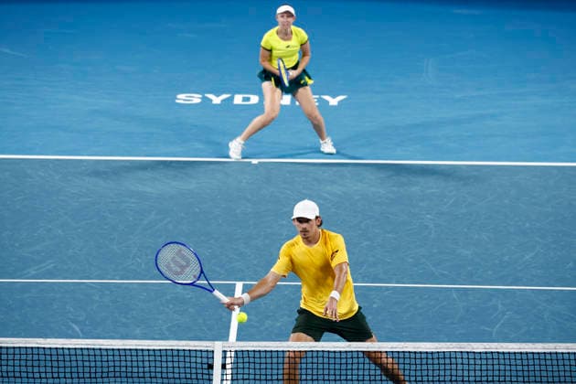 TENNIS UNITED CUP SYDNEY, Alex de Minaur of Team Australia playing with Storm Hunter of Team Australia plays a forehand in their Group D doubles match against Miriam Skoch of Team Czechia and Dalibor Svrcina of Team Czechiaduring day five of the 2026 United Cup at Ken Rosewall Arena in Sydney, Tuesday, January 6, 2026. ( NO ARCHIVING, EDITORIAL USE ONLY SYDNEY NEW SOUTH WALES AUSTRALIA  Copyright: xMARKxEVANSx 20260106177107925614