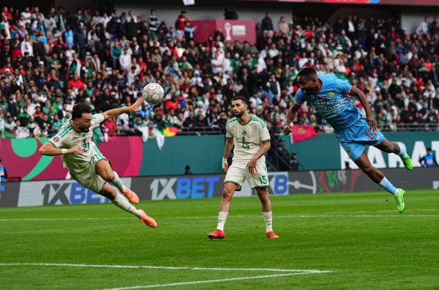 Aiss Mandi (Algeria) and Cedric Bakambu (Congo DR) battle for the ball during the Africa Cup Of Nations match between Algeria and DR Congo at Moulay El Hassan Stadium on January 6, 2026 in Rabat, Morocco. (Photo by Thor Wegner DeFodi Images) - *** Aiss Mandi Algeria and Cedric Bakambu Congo DR battle for the ball during the Africa Cup Of Nations match between Algeria and DR Congo at Moulay El Hassan Stadium on January 6, 2026 in Rabat, Morocco Photo by Thor Wegner DeFodi Images