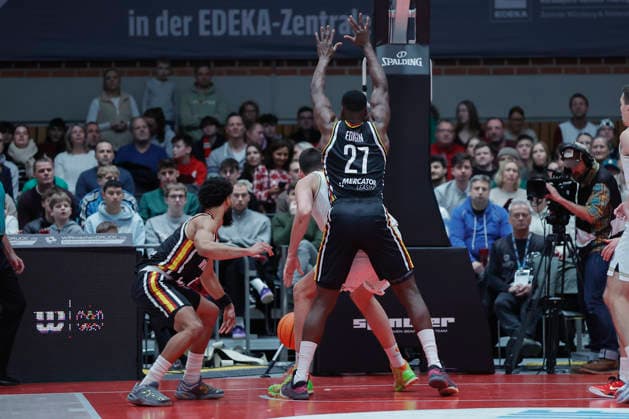 In the picture from left Davion Mintz Wuerzburg Baskets, 10 , left in the picture and Eddy Edigin Wuerzburg Baskets, 27, right in the picture defending Boris Bojanovsky Patrioti Levice, 15 06 01 2026, Fitness First Wuerzburg Baskets vs Patrioti Levice, Basketball Champions League, Play Ins, Game 1, Germany, 97072, tectake Arena Wuerzburg, Copyright: HMBxMedia xJulienxBecker