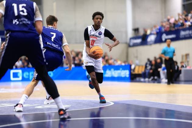 Game action with Sir Jabari Rice 10 Basketball Nymburg on the ball, defended by Dusan Neskovic 7 MLP Academics Heidelberg and Marcel Keßen 15 MLP Academics Heidelberg Basketball Champions League MLP Academics Heidelberg - ERA Basketball Nymburk Sir Jabari Rice 10 Basketball Nymburg with ball Copyright: xspeedshotx