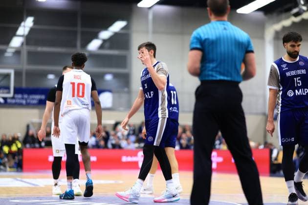 Game action with Marcel Keßen 15 MLP Academics Heidelberg and Ryan Mikesell 33 MLP Academics Heidelberg Basketball Champions League MLP Academics Heidelberg - ERA Basketball Nymburk Marcel Keßen 15 MLP Academics Heidelberg and Ryan Mikesell 33 MLP Academics Heidelberg in action Copyright: xspeedshotx