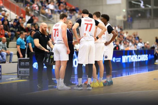 Scene with Frantisek Rylich 73 Basketball Nymburg and Vojtech Hruban 77 Basketball Nymburg and other players in a team huddle during a break in play Basketball Champions League MLP Academics Heidelberg - ERA Basketball Nymburk Team huddle with Frantisek Rylich 73 Basketball Nymburg and Vojtech Hruban 77 Basketball Nymburg Copyright: xspeedshotx