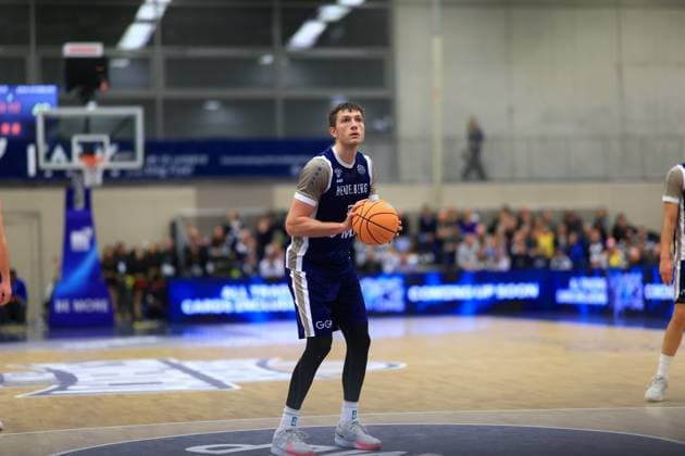 Game action with Ryan Mikesell 33 MLP Academics Heidelberg at the court center Basketball Champions League MLP Academics Heidelberg - ERA Basketball Nymburk Ryan Mikesell 33 MLP Academics Heidelberg with ball Copyright: xspeedshotx