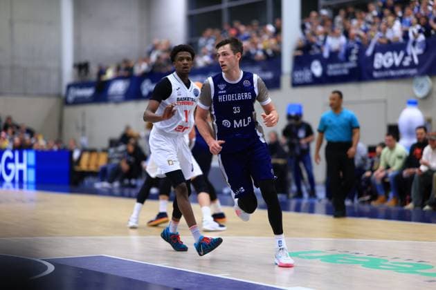Game action with Ryan Mikesell 33 MLP Academics Heidelberg and Sir Jabari Rice 10 Basketball Nymburg Basketball Champions League MLP Academics Heidelberg - ERA Basketball Nymburk Ryan Mikesell 33 MLP Academics Heidelberg and Sir Jabari Rice 10 Basketball Nymburg in action Copyright: xspeedshotx