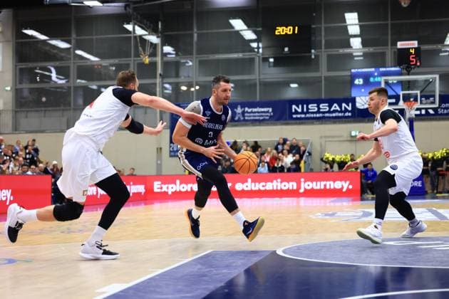 Game action with Paul Zipser 9 MLP Academics Heidelberg and Ondrej Sehnal 19 Basketball Nymburk Basketball Champions League MLP Academics Heidelberg - ERA Basketball Nymburk Paul Zipser 9 MLP Academics Heidelberg with ball against Ondrej Sehnal 19 Basketball Nymburk Copyright: xspeedshotx