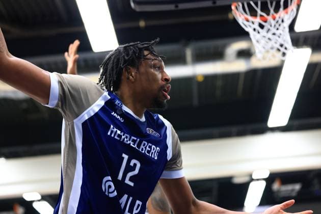Game action with Osun Osunniyi 12 MLP Academics Heidelberg at the basket Basketball Champions League MLP Academics Heidelberg - ERA Basketball Nymburk Osun Osunniyi 12 MLP Academics Heidelberg in action Copyright: xspeedshotx