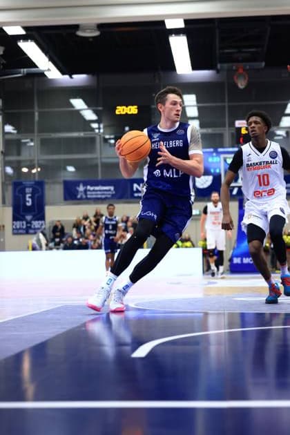 Game action with Samuell Williamson 10 MLP Academics Heidelberg and Sir Jabari Rice 10 Basketball Nymburg Basketball Champions League MLP Academics Heidelberg - ERA Basketball Nymburk Samuell Williamson 10 MLP Academics Heidelberg and Sir Jabari Rice 10 Basketball Nymburg in action Copyright: xspeedshotx