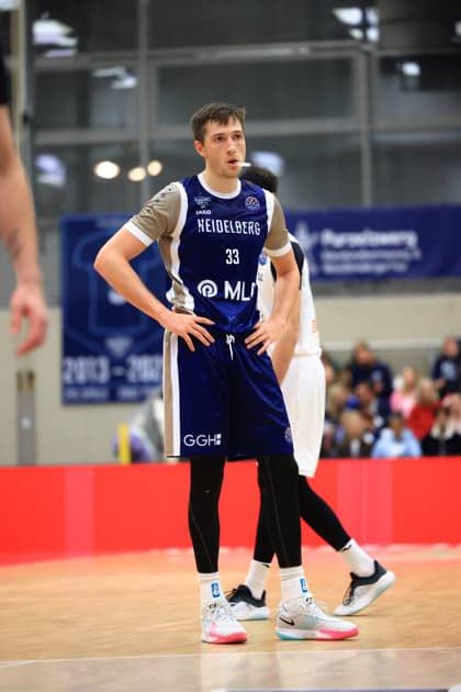 Scene with Ryan Mikesell 33 MLP Academics Heidelberg Basketball Champions League MLP Academics Heidelberg - ERA Basketball Nymburk Ryan Mikesell 33 MLP Academics Heidelberg on the court Copyright: xspeedshotx