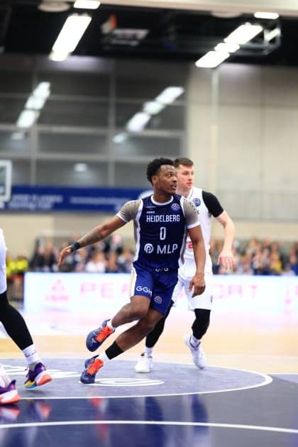 Game action with DJ Horne 0 MLP Academics Heidelberg and Sir Jabari Rice 10 Basketball Nymburk Basketball Champions League MLP Academics Heidelberg - ERA Basketball Nymburk DJ Horne 0 MLP Academics Heidelberg and Sir Jabari Rice 10 Basketball Nymburk in action Copyright: xspeedshotx