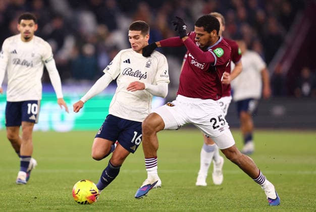 London, England, 6th January 2026. Nicolas Dominguez of Nottingham Forest and Jean-Clair Todibo of West Ham United challenge for the ball during the West Ham United vs Nottingham Forest Premier League match at the London Stadium, London. Picture credit should read: Paul Terry Sportimage EDITORIAL USE ONLY. No use with unauthorised audio, video, data, fixture lists, club league logos or live services. Online in-match use limited to 120 images, no video emulation. No use in betting, games or single club league player publications. SPI_019_PT_West_Ham_Notts_Forest SPI-4433-0019