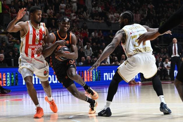 Crvena Zvezda v Valencia - EuroLeague BELGRADE, SERBIA - JANUARY 06: Brancou Badio (0) of Valencia in action against Jared Butler (6) of Crvena Zvezda during the EuroLeague week 20 basketball match between Crvena Zvezda and Valencia Basket at Aleksandar Nikolic Hall on January 06, 2026 in Belgrade, Serbia. Amir Hamzagic Anadolu Belgrade Serbia. Editorial use only. Please get in touch for any other usage.  Copyright: x2026xAnadoluxAmirxHamzagicx