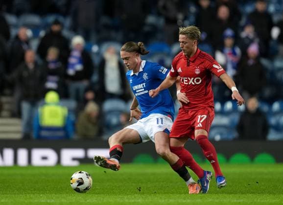 Thelo Aasgaard of Rangers beats Jesper Karlsson of Aberdeen. Final score Rangers 2 Aberdeen 0. Rangers v Aberdeen, William Hill Scottish Premiership, Football, Ibrox Stadium, Glasgow, Scotland, UK - 06 Jan 2026Glasgow Ibrox Stadium United Kingdom EDITORIAL USE ONLY No use with unauthorised audio, video, data, fixture lists, club league logos or live services. Online in-match use limited to 120 images, no video emulation. No use in betting, games or single club league player publications. Copyright: xStuartxWallace Shutterstockx 16225279ca