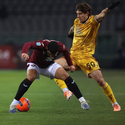 Turin, Italy, 7th January 2026. Alessandro Zanoli of Udinese Calcio clashes with Zakaria Aboukhlal of Torino FC during the Torino vs Udinese Serie A match at Stadio Grande Torino, Turin. Picture credit should read: Jonathan Moscrop Sportimage EDITORIAL USE ONLY. No use with unauthorised audio, video, data, fixture lists, club league logos or live services. Online in-match use limited to 120 images, no video emulation. No use in betting, games or single club league player publications. SPI_009_JM_TORO_UDINESE_ SPI-4408-0009