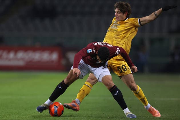 Turin, Italy, 7th January 2026. Alessandro Zanoli of Udinese Calcio clashes with Zakaria Aboukhlal of Torino FC during the Torino vs Udinese Serie A match at Stadio Grande Torino, Turin. Picture credit should read: Jonathan Moscrop Sportimage EDITORIAL USE ONLY. No use with unauthorised audio, video, data, fixture lists, club league logos or live services. Online in-match use limited to 120 images, no video emulation. No use in betting, games or single club league player publications. SPI_010_JM_TORO_UDINESE_ SPI-4408-0010