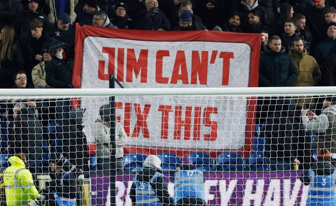 Burnley, England, 7th January 2026. Manchester United, ManU fans hold up a banner during the Burnley vs Manchester United Premier League match at Turf Moor, Burnley. Picture credit should read: Cody Froggatt Sportimage EDITORIAL USE ONLY. No use with unauthorised audio, video, data, fixture lists, club league logos or live services. Online in-match use limited to 120 images, no video emulation. No use in betting, games or single club league player publications. SPI_032_CF_Burnley_Man_Utd_ SPI-4437-0032