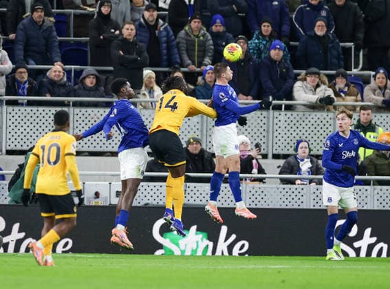 7th January 2026; Hill Dickinson Stadium, Liverpool, England; Premier League Football, Everton versus Wolverhampton Wanderers; Vitaliy Mykolenko of Everton FC wins the header is under pressure from Tolu Arokodare of Wolverhampton Wanderers  RogerxEvans Content restricted for UK based newspaper