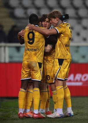 Turin, Italy, 7th January 2026. Nicolo Zaniolo of Udinese Calcio celebrates with team mates after scoring to give the side a 1-0 lead during the Torino vs Udinese Serie A match at Stadio Grande Torino, Turin. Picture credit should read: Jonathan Moscrop Sportimage EDITORIAL USE ONLY. No use with unauthorised audio, video, data, fixture lists, club league logos or live services. Online in-match use limited to 120 images, no video emulation. No use in betting, games or single club league player publications. SPI_030_JM_TORO_UDINESE_ SPI-4408-0030