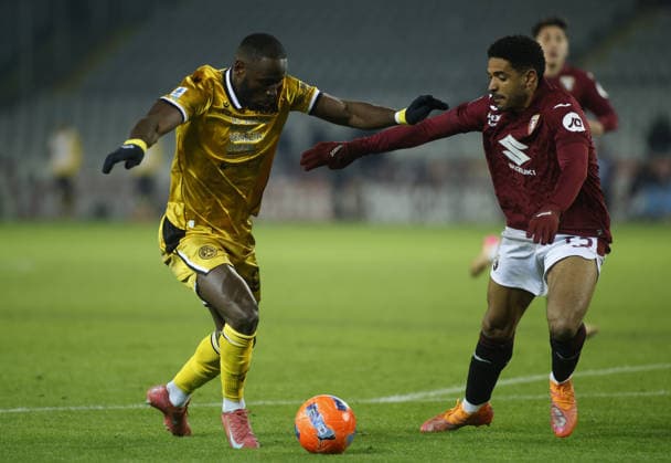 Keinan Davis of Udinese Calcio and Saul Coco of Torino FC during the Italian Serie A, 2025 26 season, football match between Torino FC and Udinese Calcio, on 07 January 2026 at Stadio Olimpico â?? Grande Torino , Turin Italy. Photo Nderim KACELI  Copyright: xNderimxKaceli IPAxSportx xipa-agency.netx xx IPA_69799462 IPA_Agency_IPA69799462
