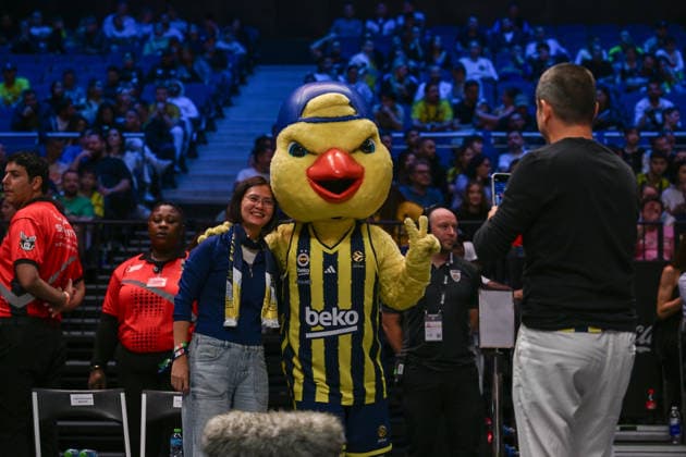 Dubai Basketball v Fenerbahce Beko - EuroLeague DUBAI, UNITED ARAB EMIRATES - JANUARY 8: Fenerbahce Beko mascot Yellow poses for photos with fans during the EuroLeague 2025-26 season game between Dubai Basketball and Fenerbahce Beko at the Coca Cola Arena in Dubai, United Arab Emirates on January 8, 2026. Waleed Zein Anadolu Dubai United Arab Emirates. Editorial use only. Please get in touch for any other usage.  Copyright: x2026xAnadoluxWaleedxZeinx