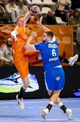 ALMERE - Niels Versteijnen of the Netherlands in action against Petros Boukovinas of Greece and Theodoros Boskos of Greece during the Netherlands-Greece Golden League handball match. The handball players are preparing for the European Championship, EM, Europameisterschaft SEM VAN DER WAL ANP xVIxANPxSportx xxANPxIVx 546719219 originalFilename: 546719219.jpg